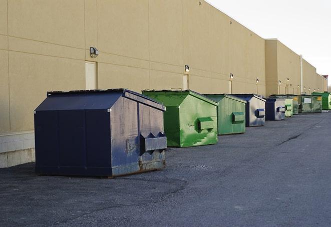 a view of a dumpster truck on a construction site in Haverstraw, NY